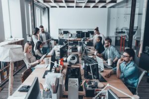 Image of large group of coworkers all working together representing as they are working in the leantime open source community